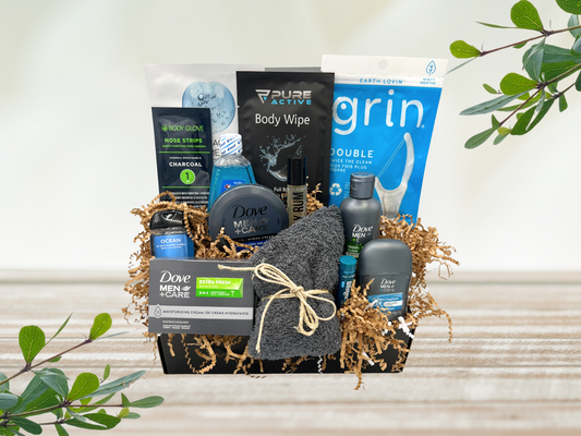 Men’s self-care gift box featuring essentials for grooming and hygiene. Includes deodorant, bar soap, scalp care shampoo, skin moisturizer, antiperspirant, cleansing hand gel, cotton cleansing cloth, floss sticks, face mask, minty mouthwash, cleansing body wipe, bay rum cologne oil, and moisturizing lip balm. Perfect for refreshing and revitalizing daily routines.